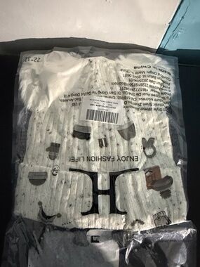 Amazon Kids White Knit Hat with Small Multicolor Accents